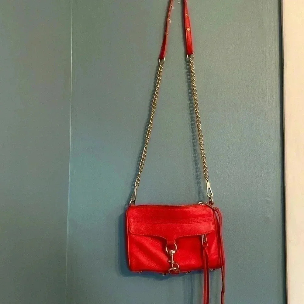 Rebecca Minkoff red leather cross body with gold chain strap and gold accents